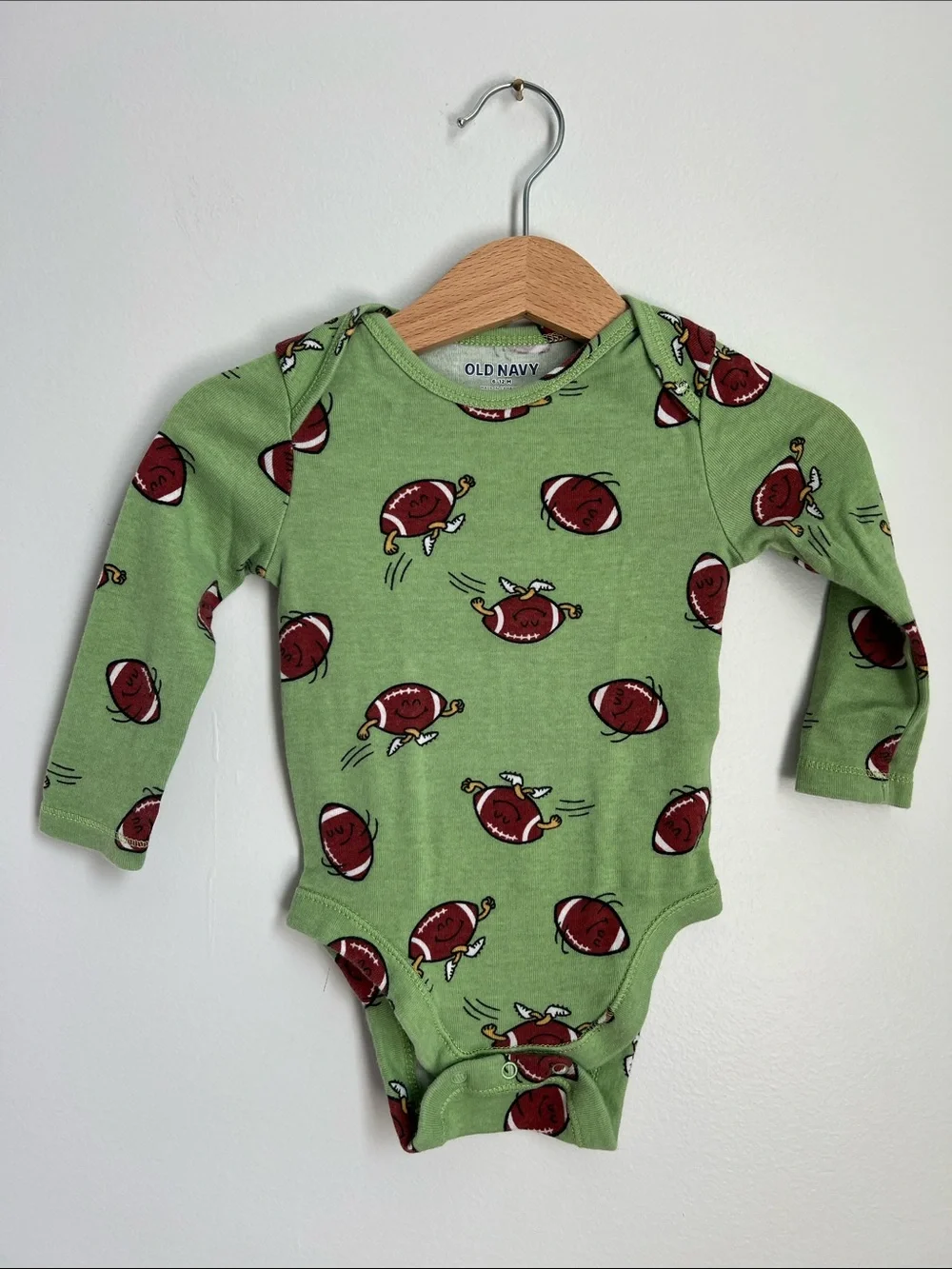 Old Navy | Green Football-Print Long-Sleeve Baby One-Piece 6-12 Months